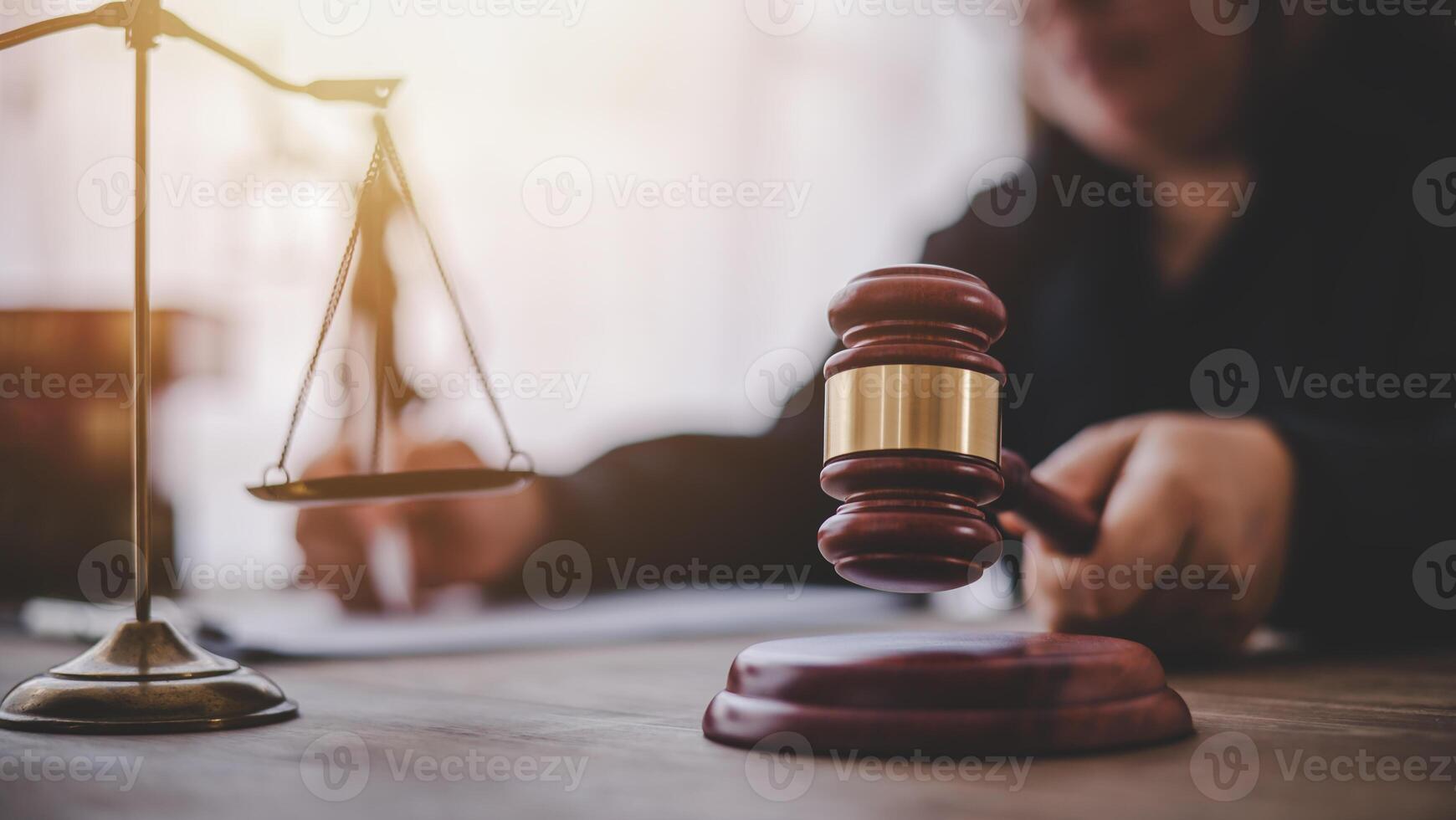 Law theme, mallet of the judge, law enforcement officers, evidence-based cases and documents taken into account. photo