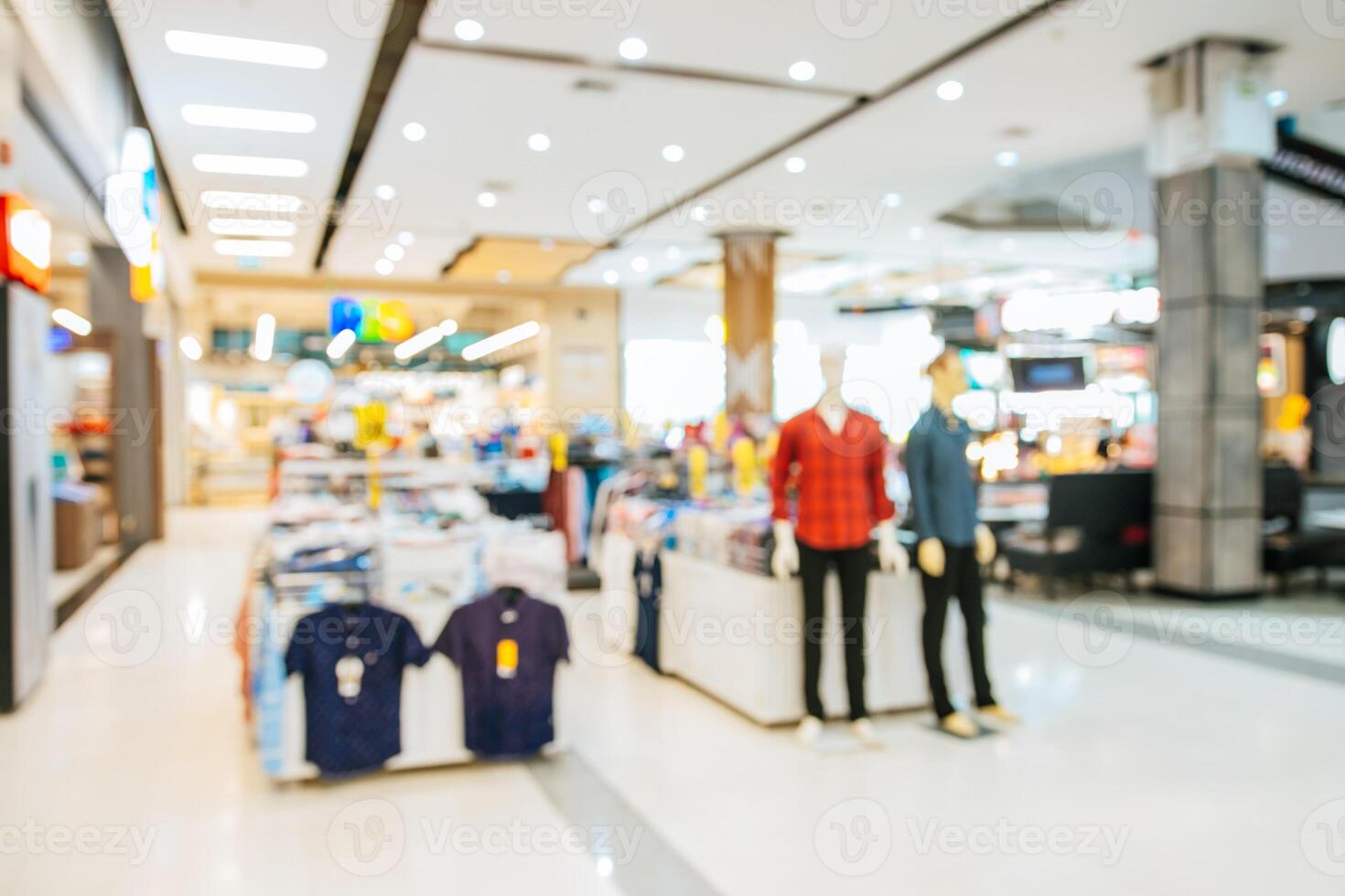 Abstract blurred of people in shopping mall of department store for background photo