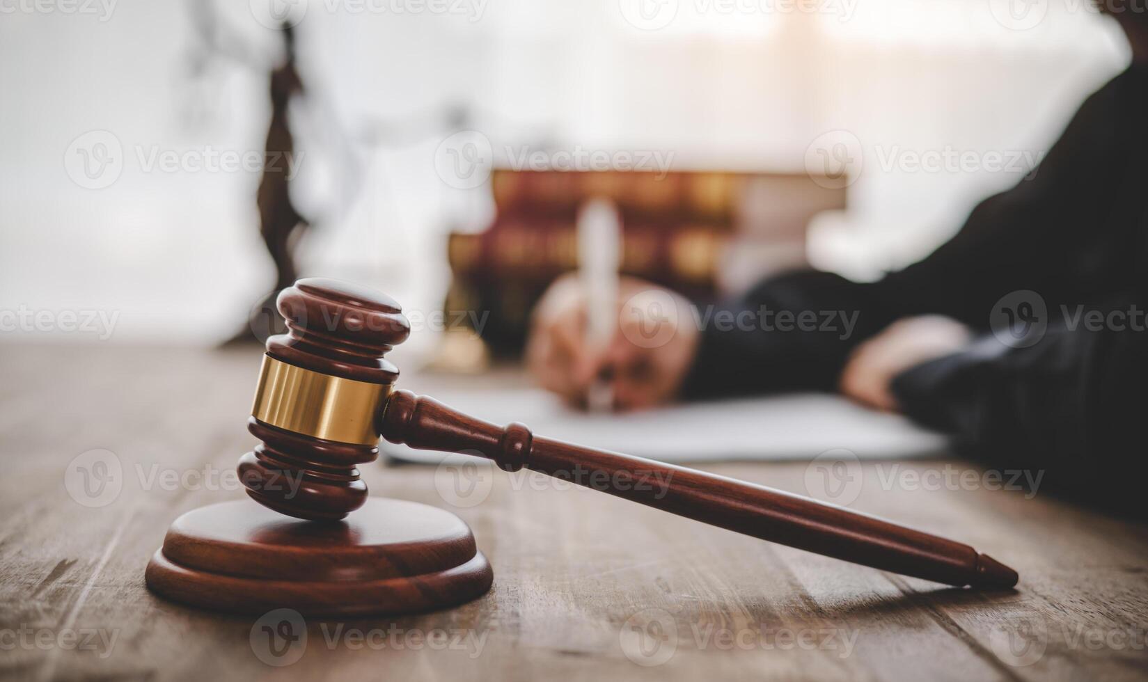 Law theme, mallet of the judge, law enforcement officers, evidence-based cases and documents taken into account. photo