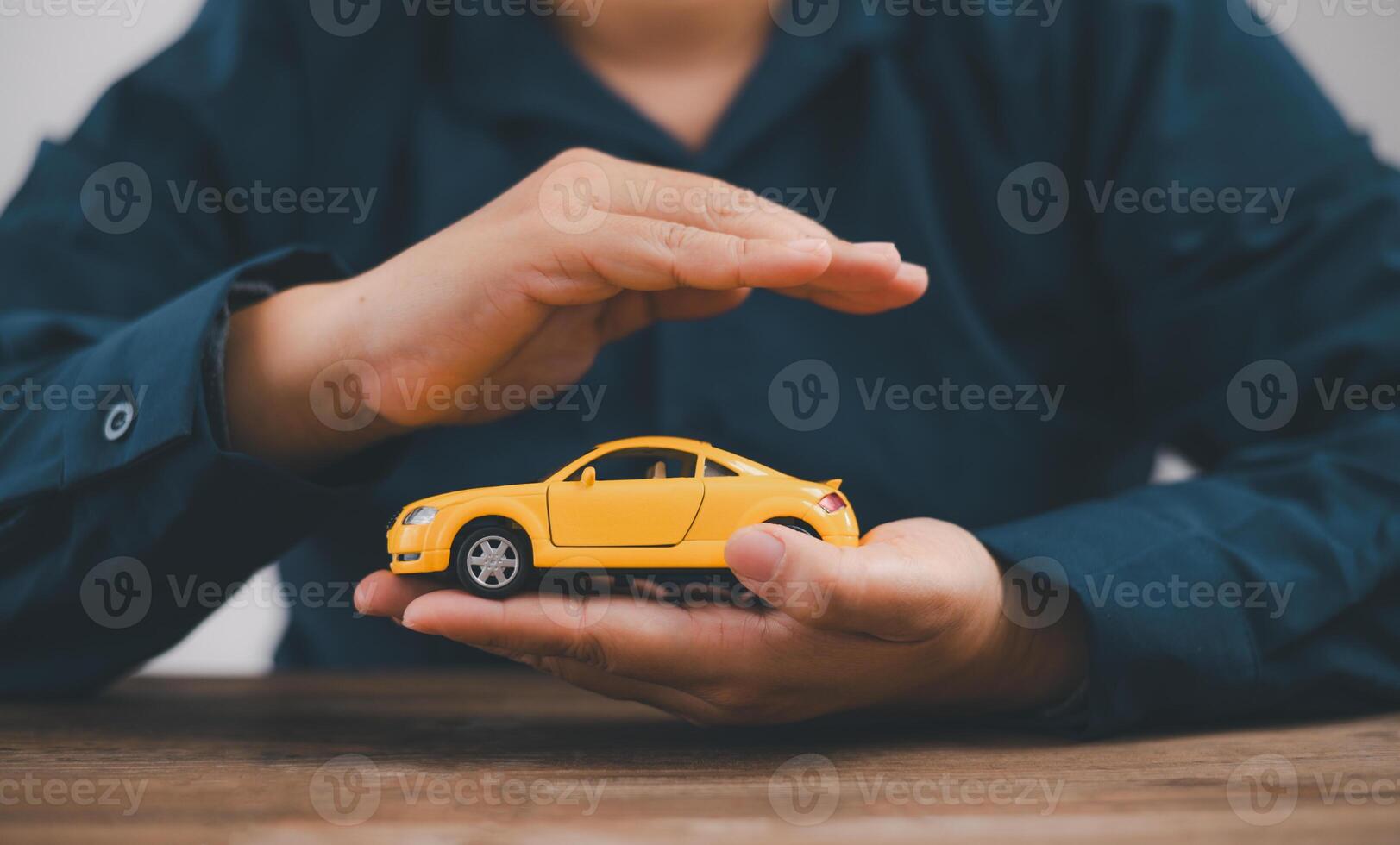 Hand Protecting Car,symbol of Car Insurance and Coverage for Auto Safety , Security,Protection against Accidents and Damages photo
