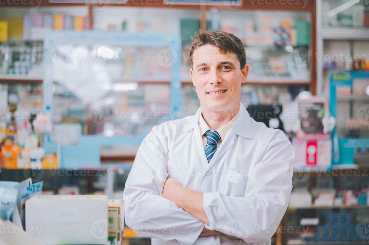 Male pharmacist posing confidently welcoming, advising patients and prescription patients in modern pharmacy. photo