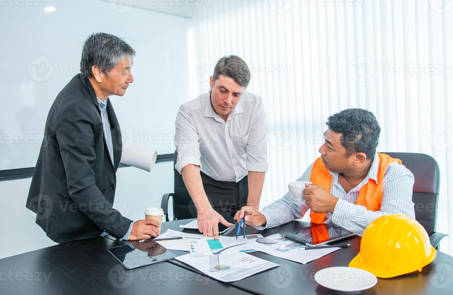 Business people team work while working in board room, design project, discussing ideas,discuss financial statistics together teamwork concept photo