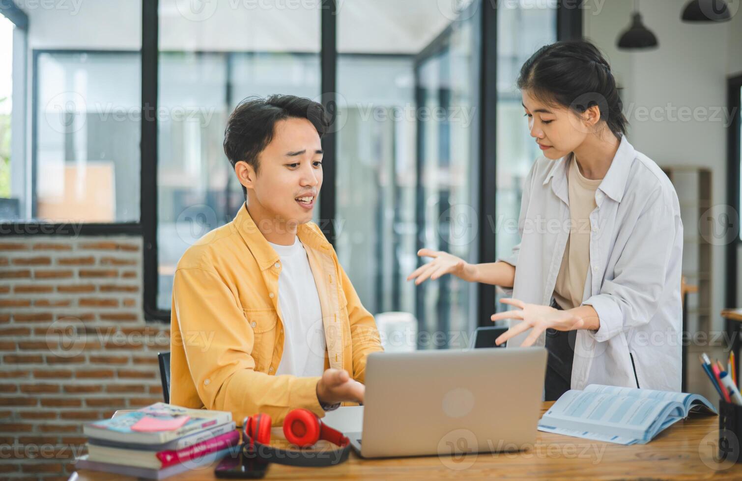 Young students quarrel when their work fails and goals are not met. , communication does not understand each other photo