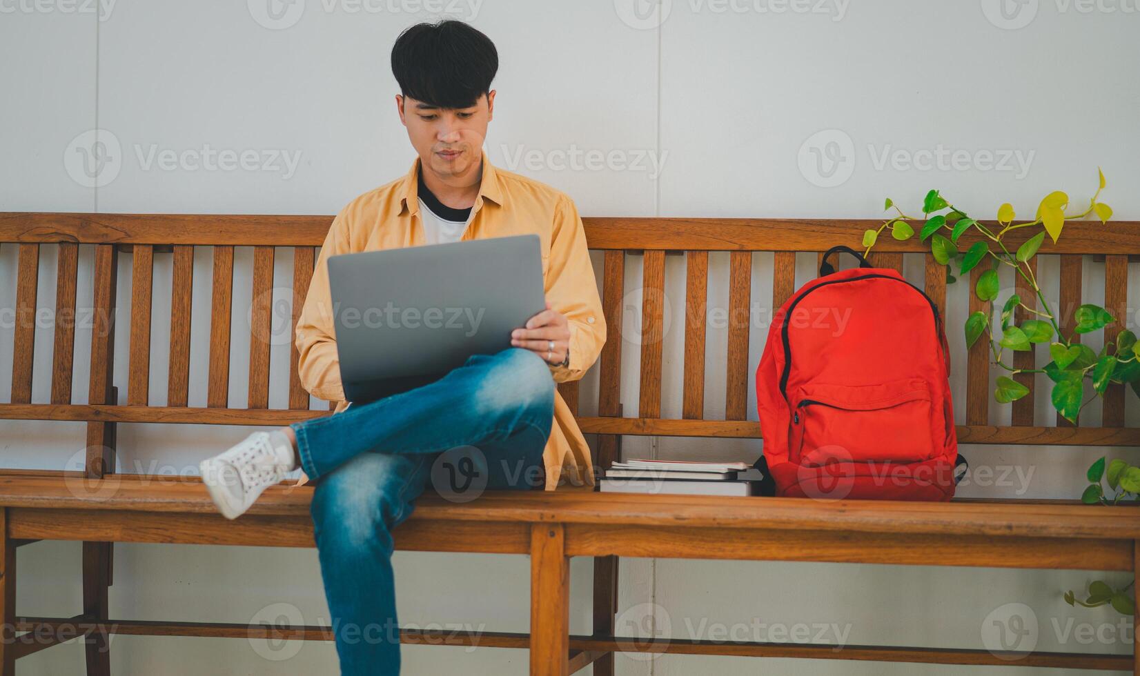 Students are doing research and finding knowledge on the internet on laptops in the university area. photo