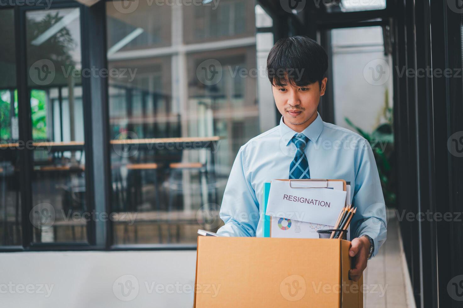 Young company employee stressed After resigning from work to find a new job , was fired by the company or when the employment contract expires, resulting in being unemployed photo