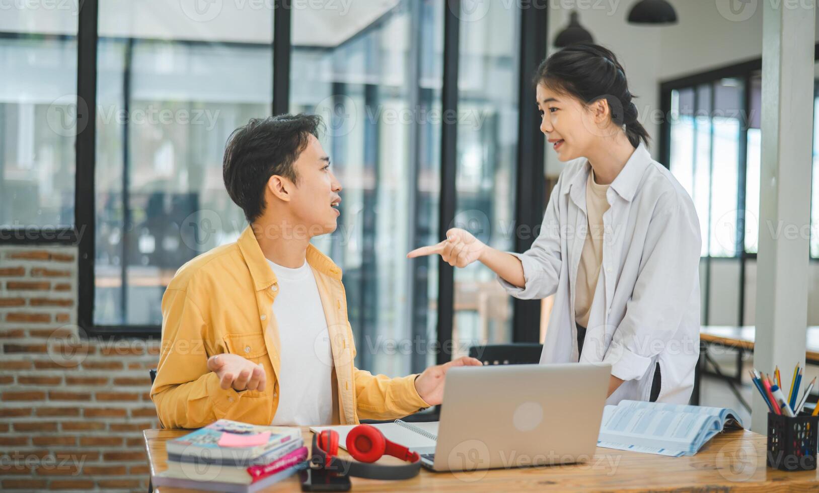 Young students quarrel when their work fails and goals are not met. , communication does not understand each other photo