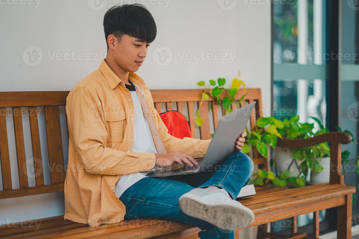Students are doing research and finding knowledge on the internet on laptops in the university area. photo
