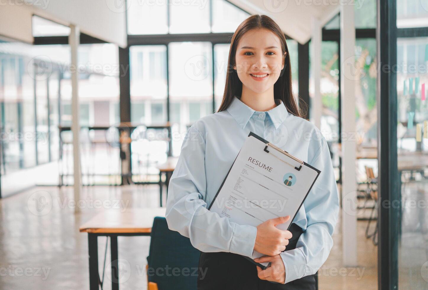 Asian young holding resume applying to apply for a job photo