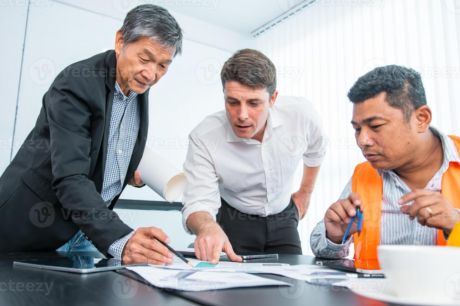 Business people team work while working in board room, design project, discussing ideas,discuss financial statistics together teamwork concept photo