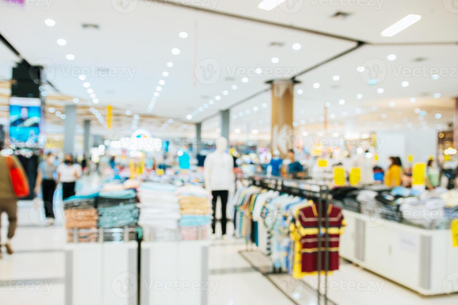 Abstract blurred of people in shopping mall of department store for background photo