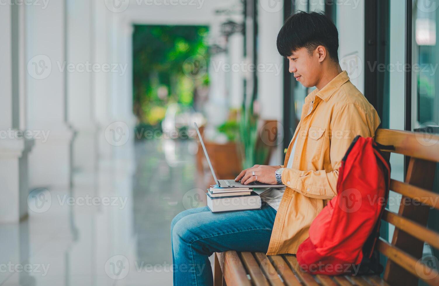 Students are doing research and finding knowledge on the internet on laptops in the university area. photo