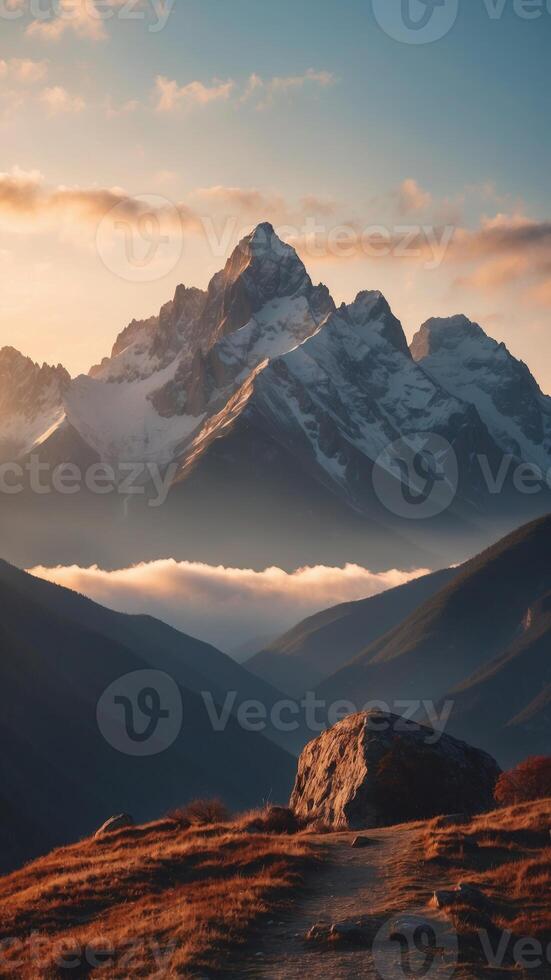 A mountain range that defies gravity, its peaks floating above the clouds. photo