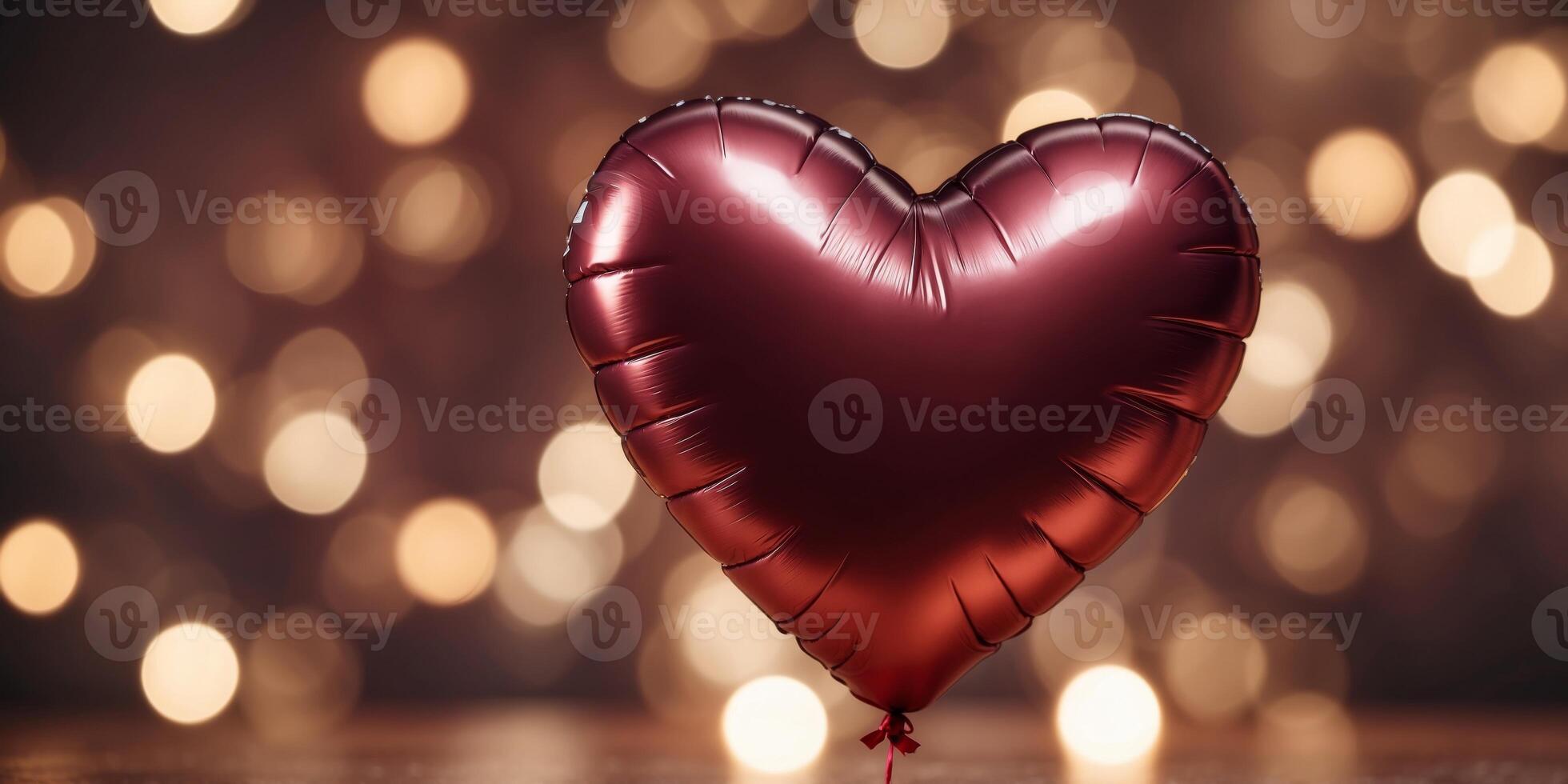 Valentine's day Heart shape foil balloon on maroon. photo