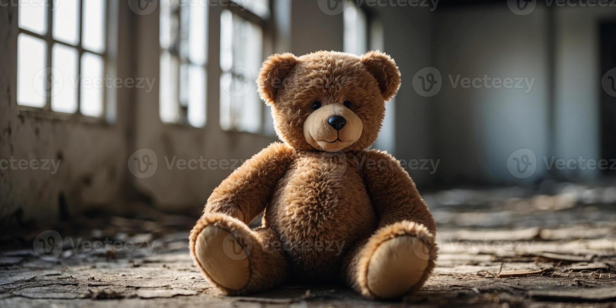teddy bear lying in an abandoned building. photo