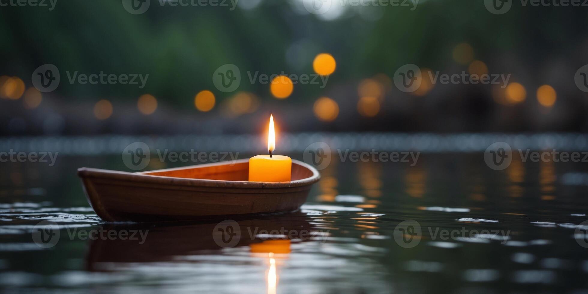 An candle is floating on a small boat in a pond. photo