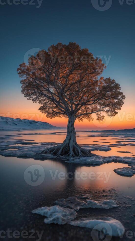 A tree with roots that glow like lava, growing in the middle of a frozen ocean. photo