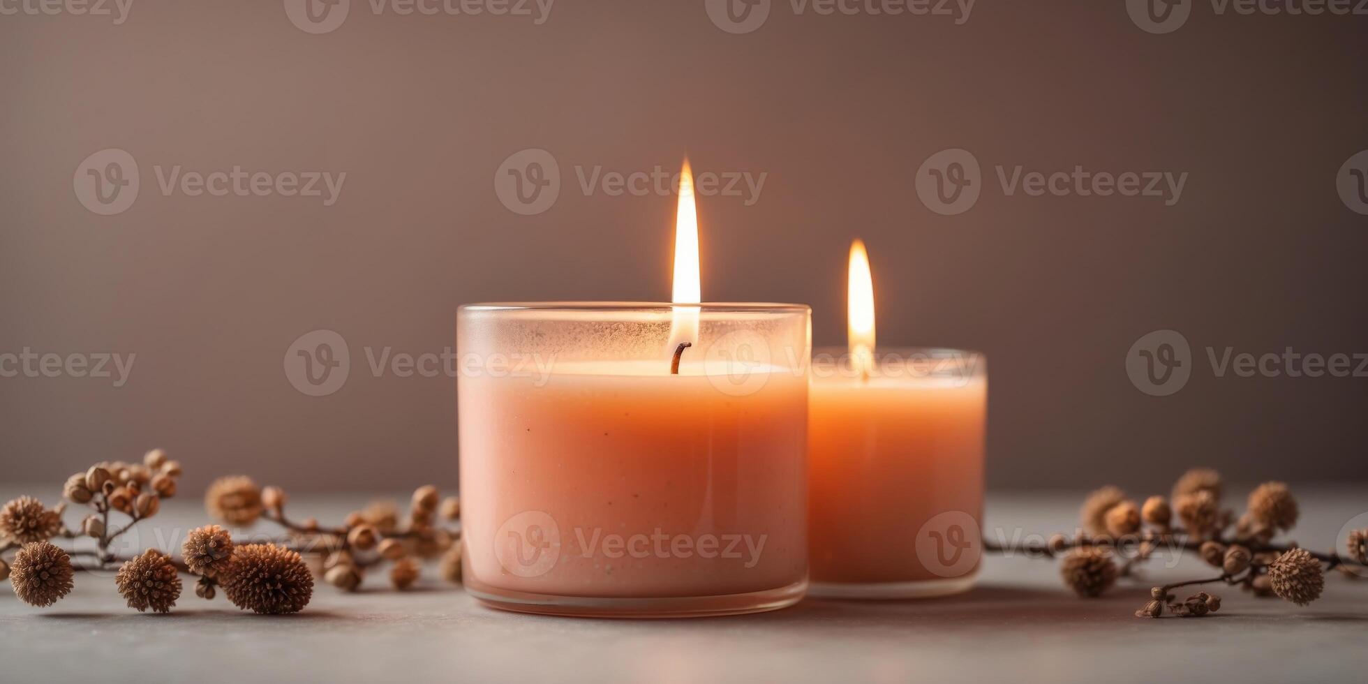 Unlit peach fuzz color candle on trendy minimal background with modern tone and hue. photo