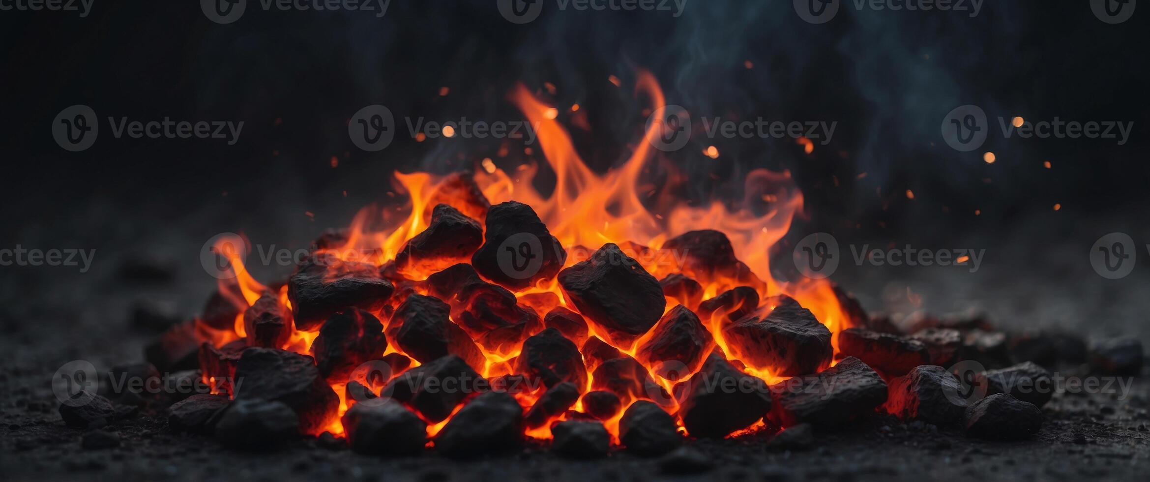Burning Hot Coals and Glowing Embers Amid Dark Ashes. photo