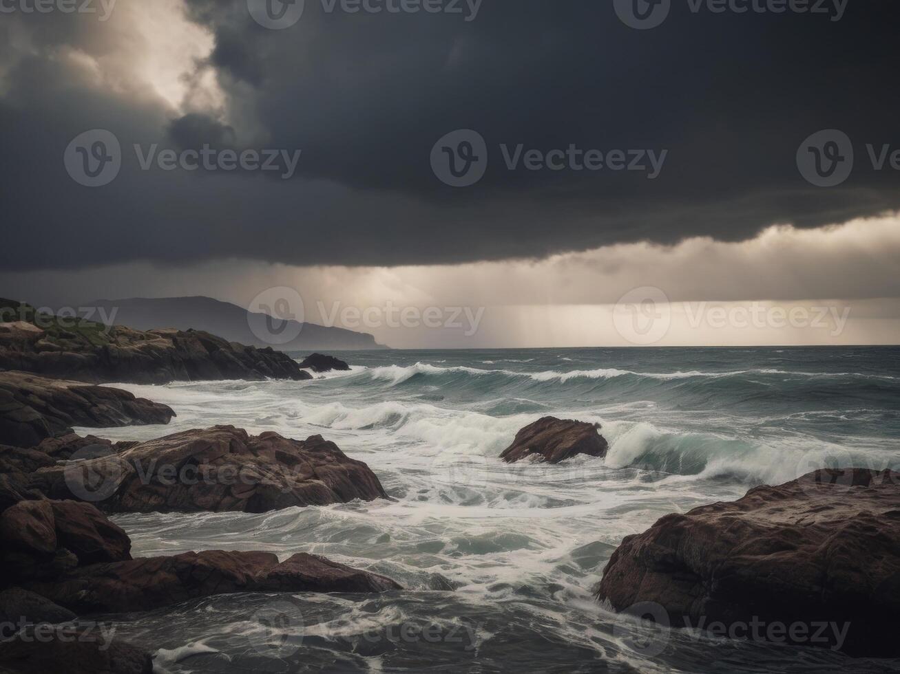 Dramatic storm clouds rolling over a rugged and moody coastal landscape. photo