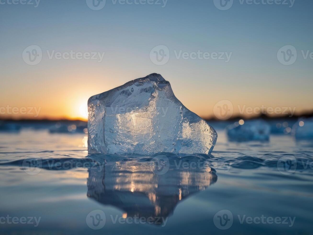 ice berg floating in water under blue sky. photo