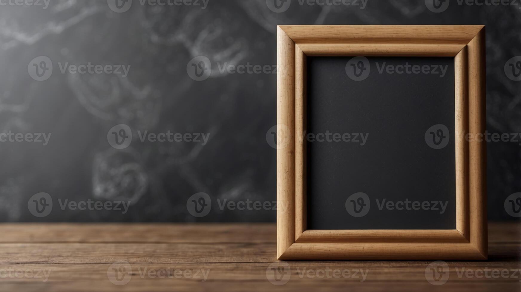 A chalkboard with a wooden frame and a chalkboard background. photo