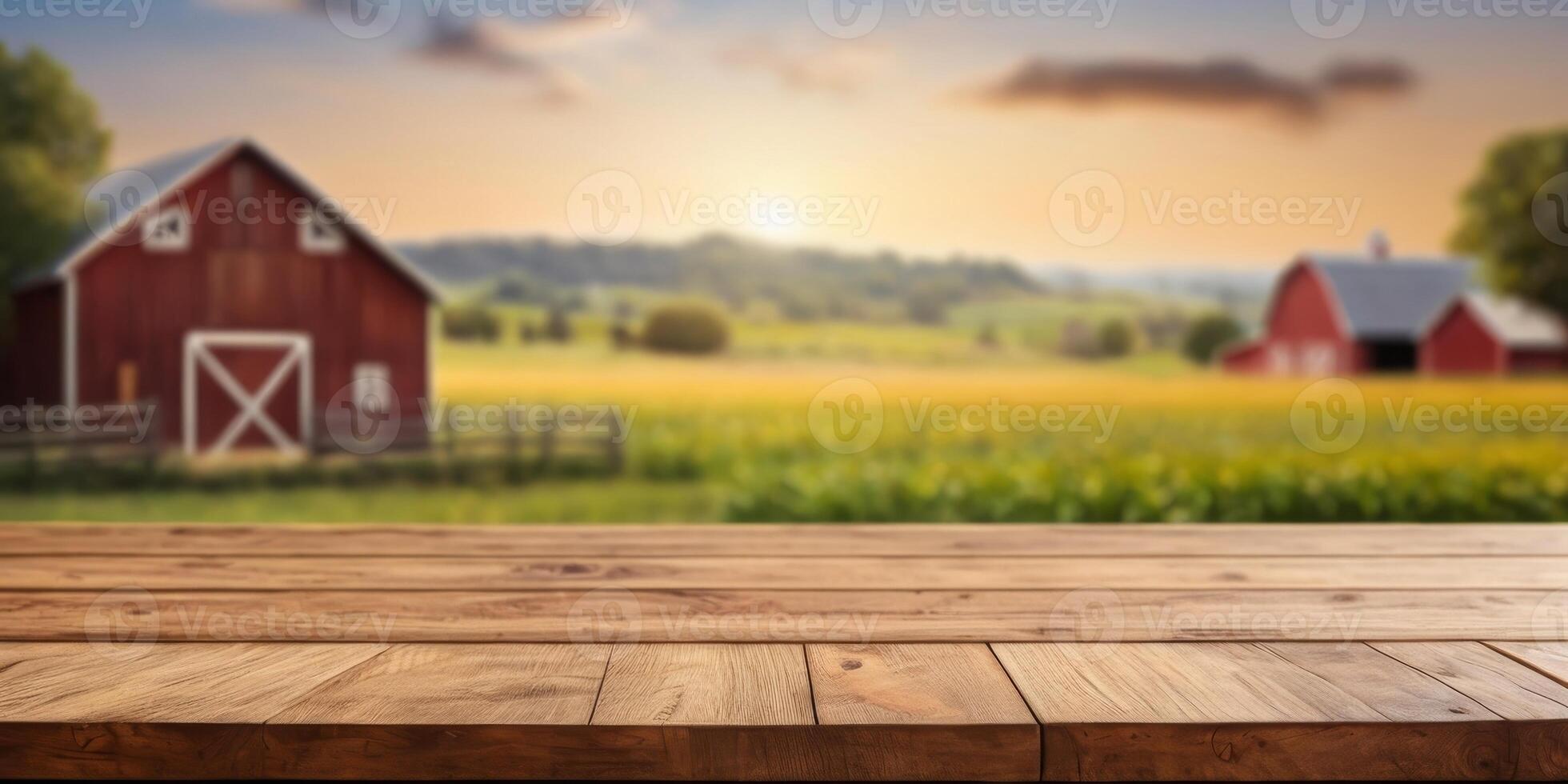 empty wooden table top for product display montages with blurred farm barns and buildings background. photo