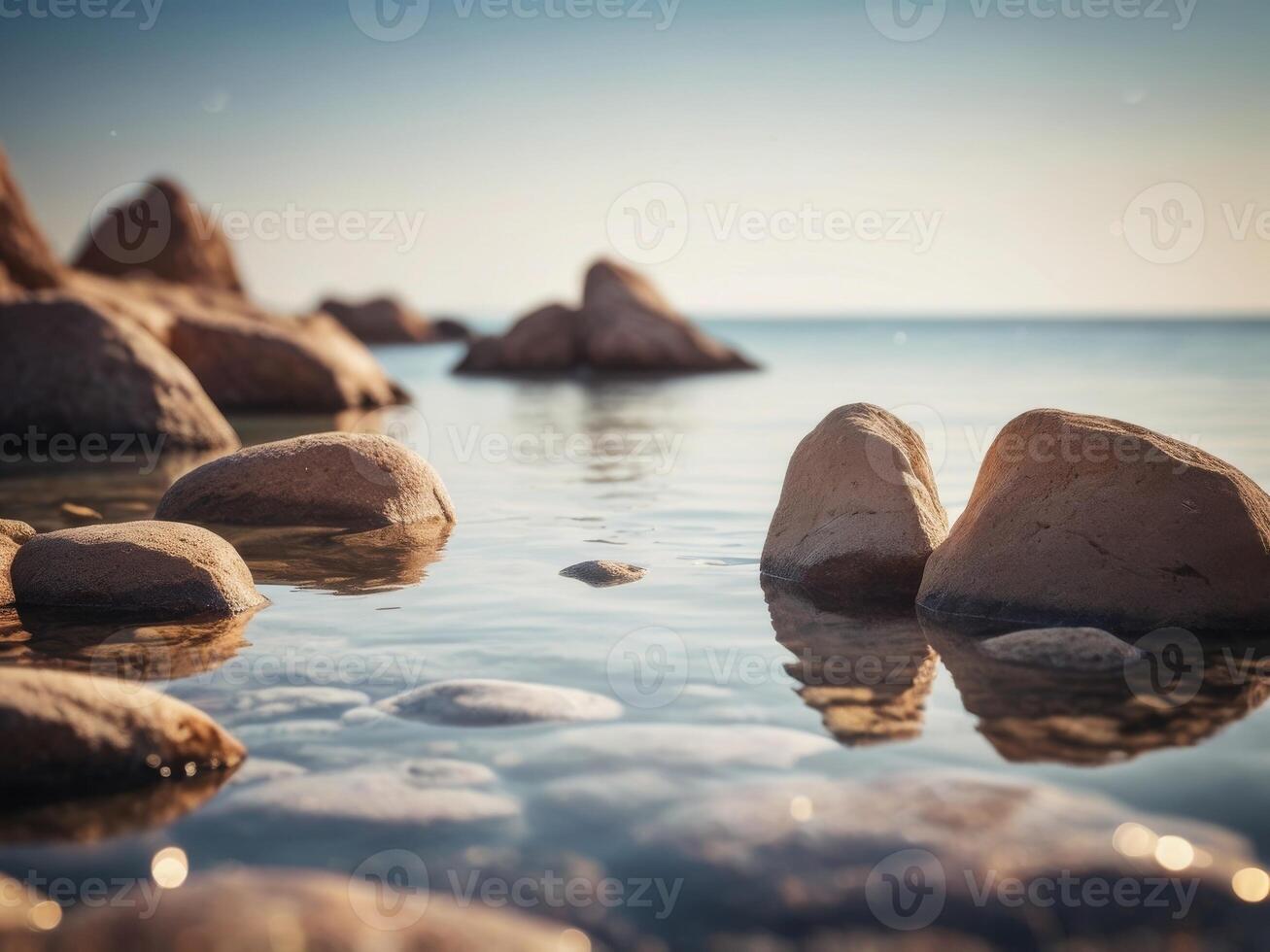 Serene coastal landscape with rock formations and calm waters. photo