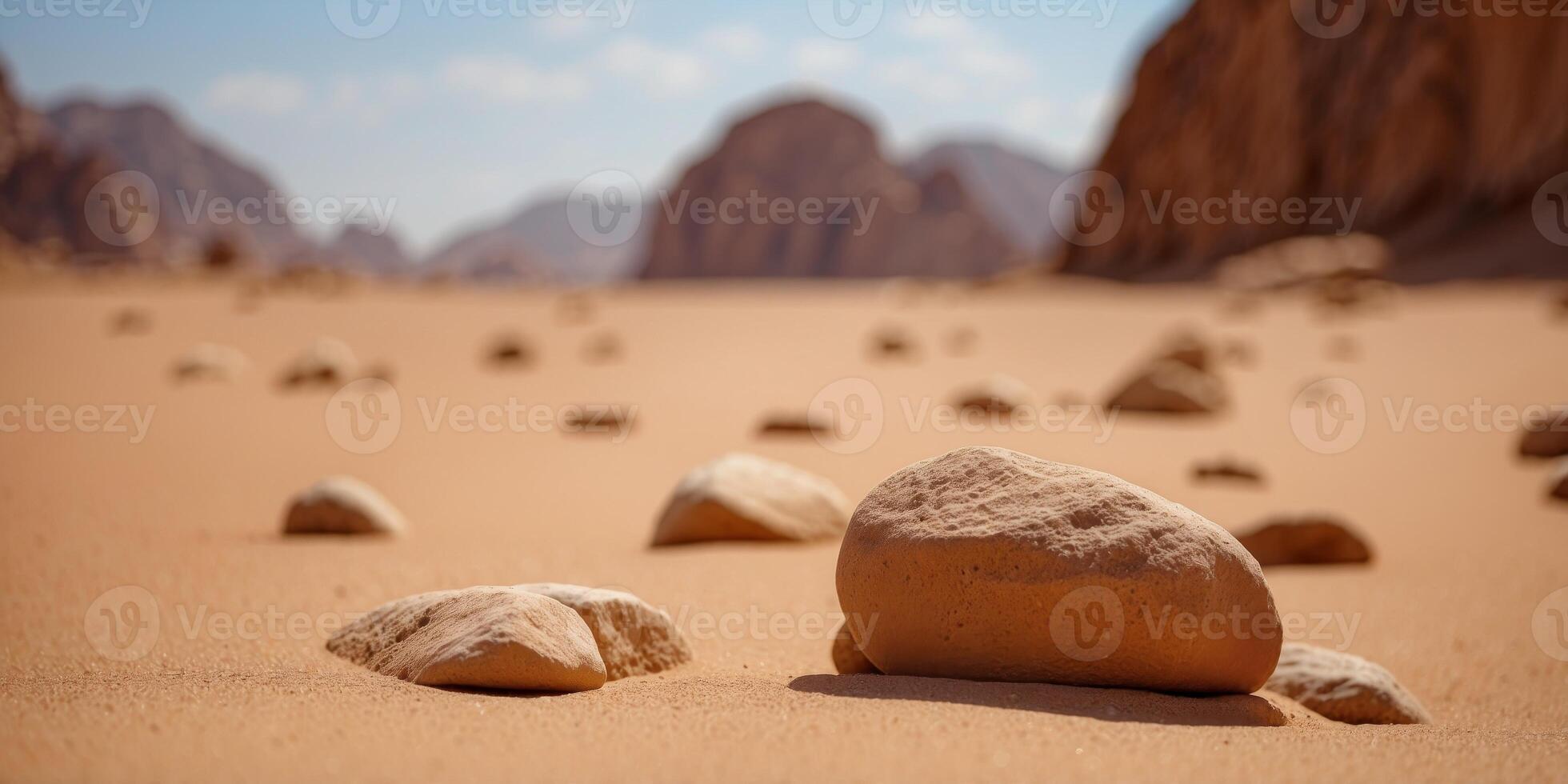 clouds of sand blow around rocks in the midst of a vast sand desert in wadi rum desert jordan. photo