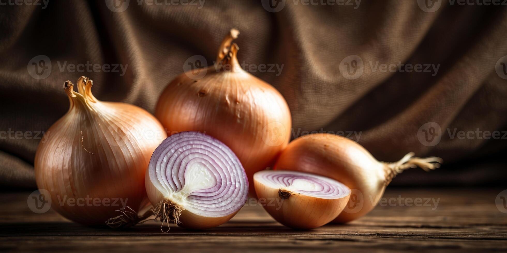 Fresh Whole and Sliced Onion on Rustic Wooden Table with Burlap Background. photo