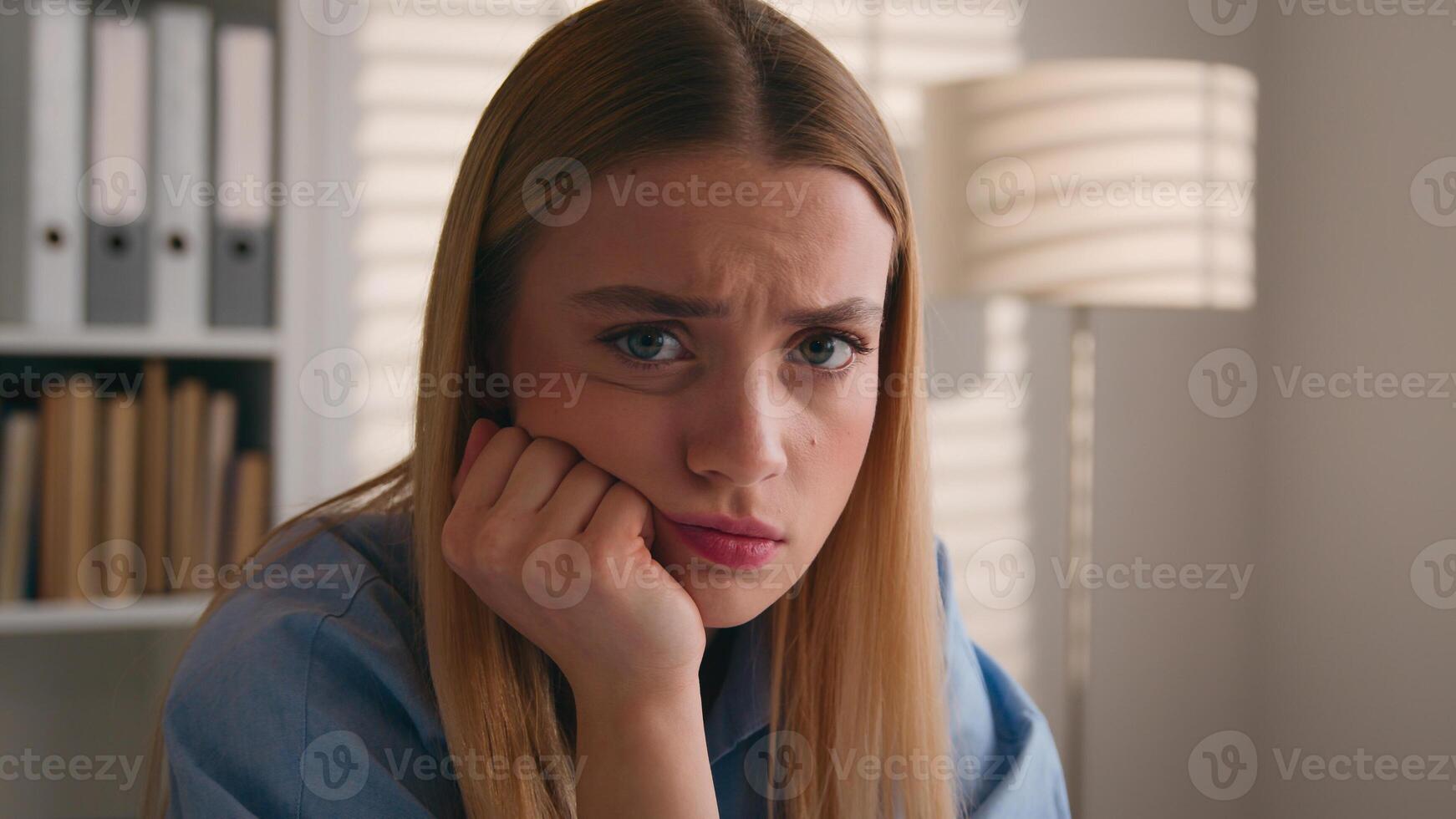 Close up sad dissatisfied confused bored female face portrait stress offended woman Caucasian displeased girl disappointed at office business work study problem failure boring annoyed grimace thinking photo