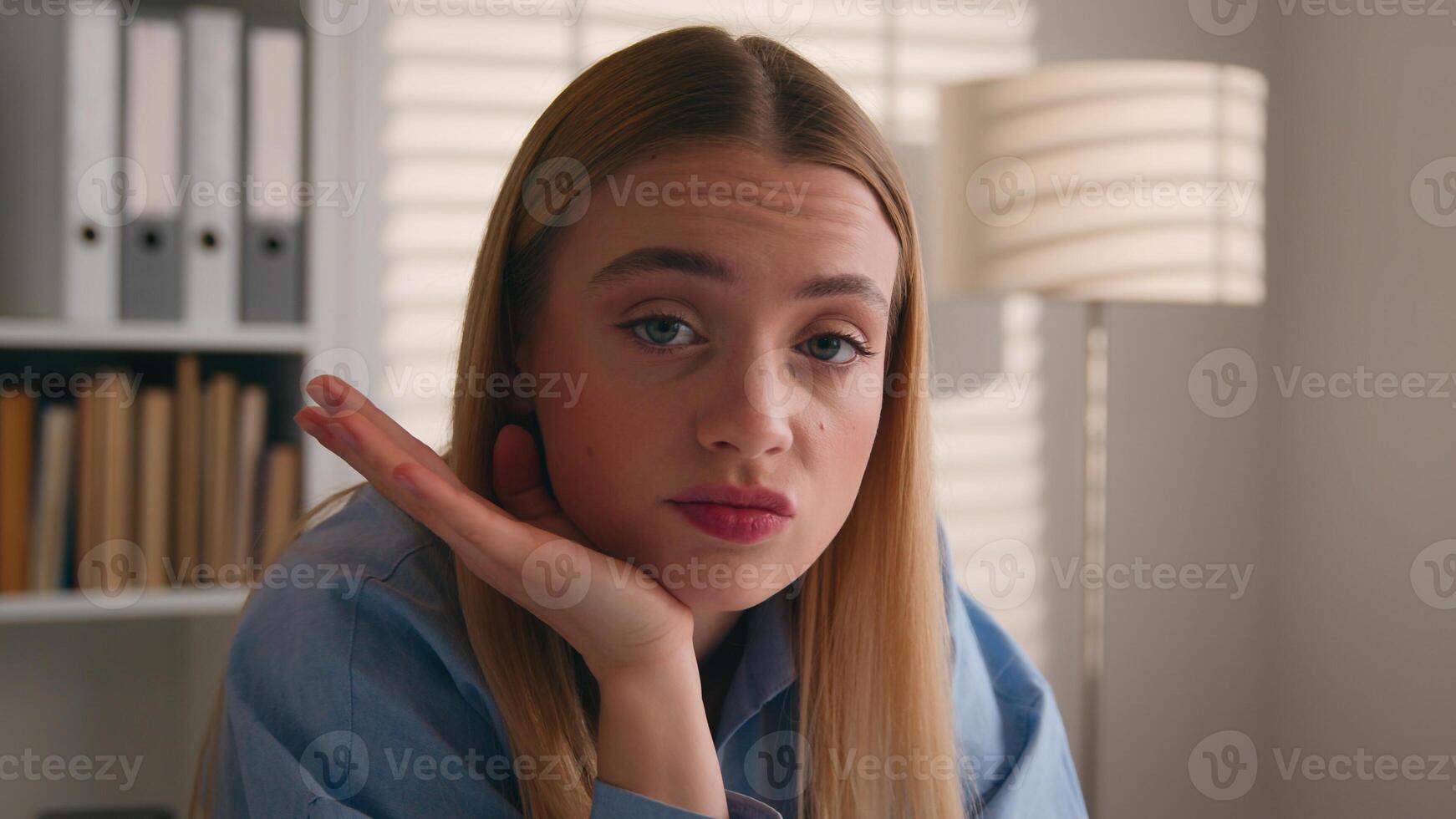 Close up sad dissatisfied confused bored female face portrait stress offended woman Caucasian displeased girl disappointed at office business work study problem failure boring annoyed grimace thinking photo