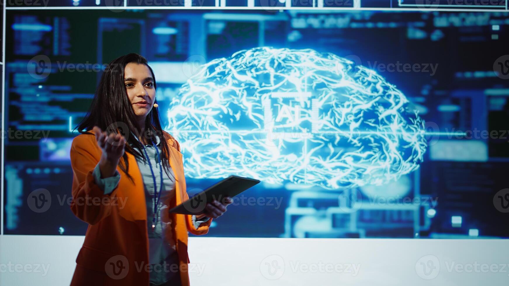 Specialist talking at global conference, exploring subjects such as enterprise AI, machine learning, security, ethical AI, deep learning, data ecosystems and natural language processing, camera B photo