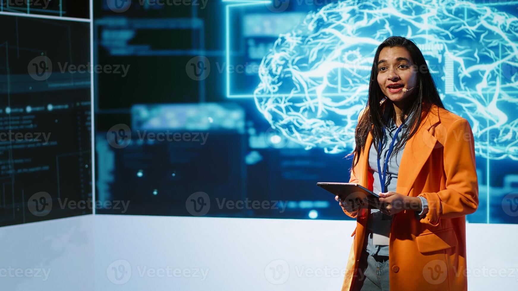 Specialist talking at global conference, exploring subjects such as enterprise AI, machine learning, security, ethical AI, deep learning, data ecosystems and natural language processing, camera A photo