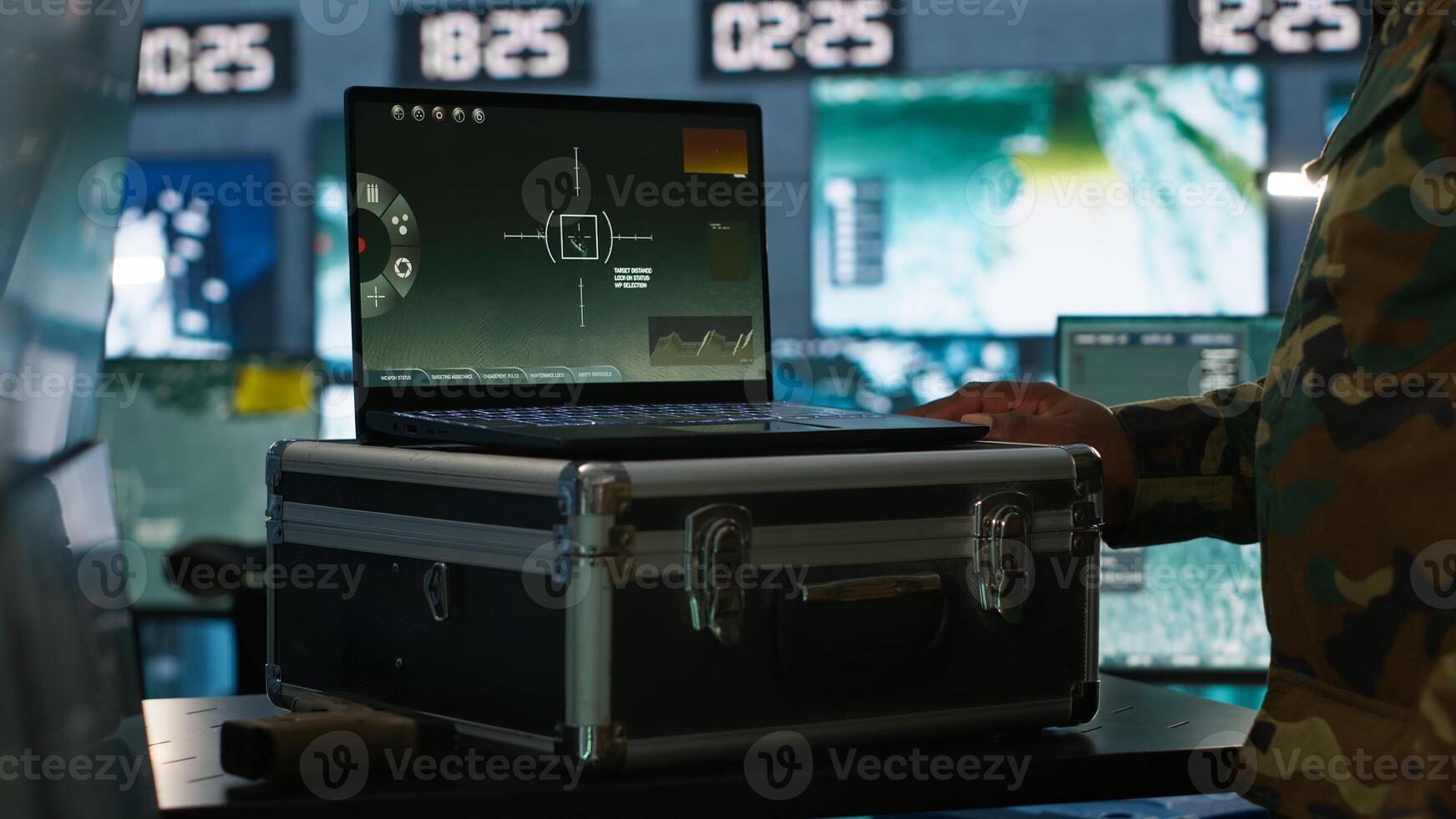 Air force officer performing tactical level surveillance in command room using laptop. Close up of military specialist in base of operations using radar on notebook to look at assault zones, camera A photo