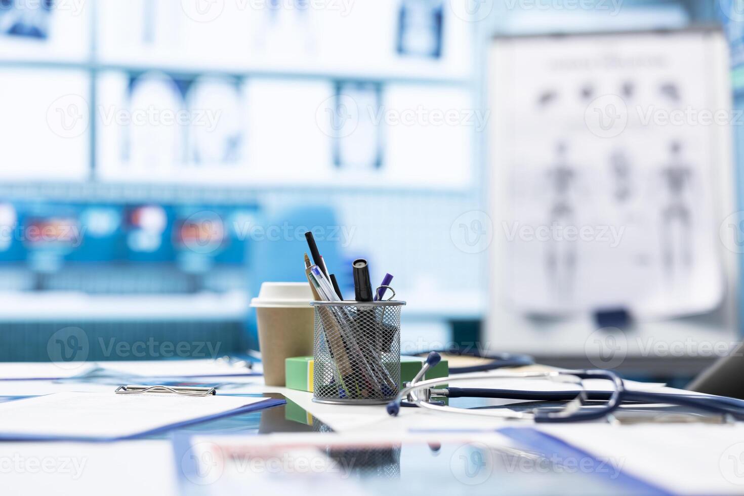 Empty medical cabinet equipped with modern equipment designed to help in finding the right diagnostic, x ray machine and hospital records. Private clinic office space for healthcare industry. photo