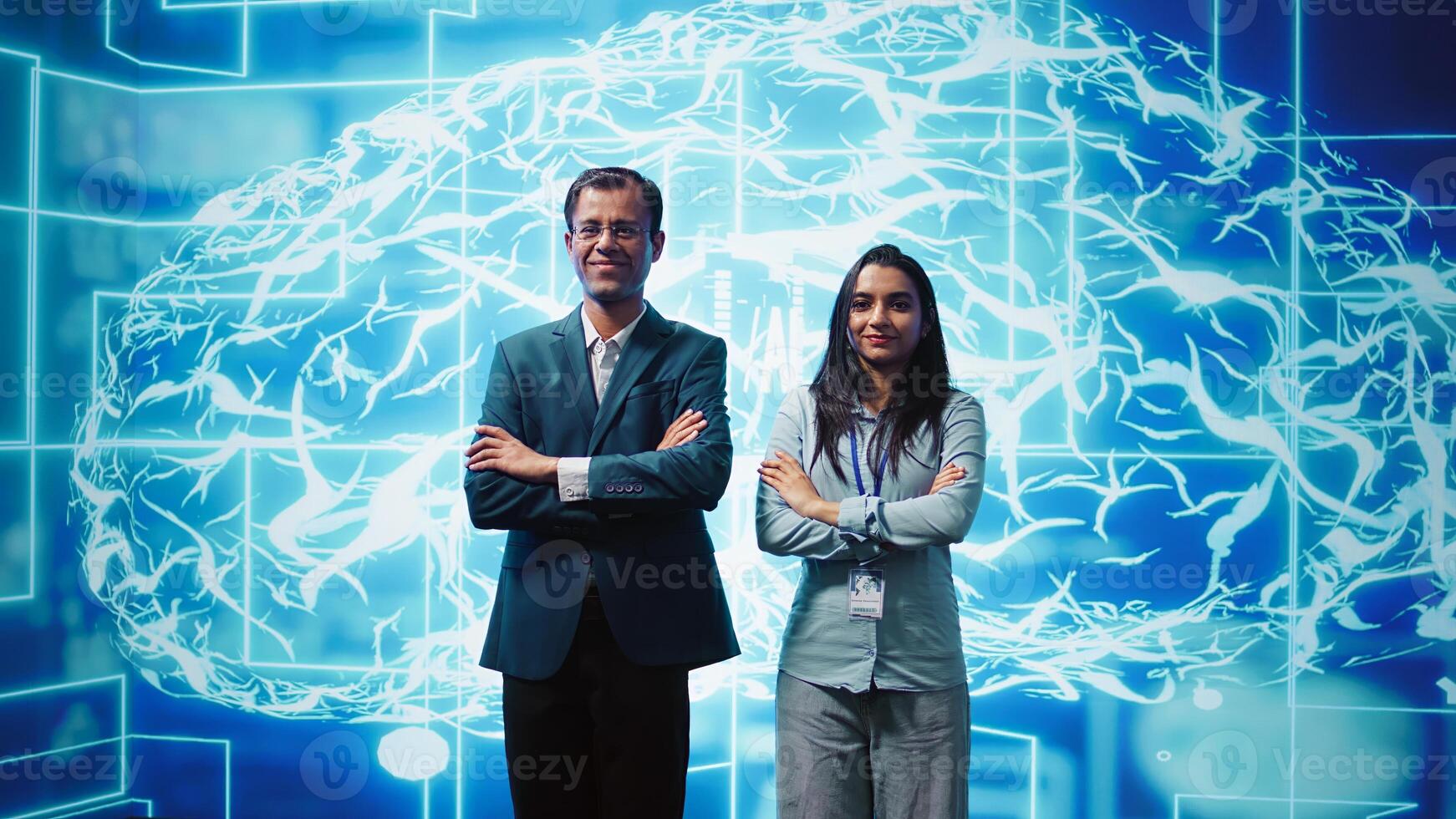 Portrait of cheerful team of admins using artificial intelligence computing simulating human brain. Smiling colleagues working with AI machine learning algorithms, camera B photo