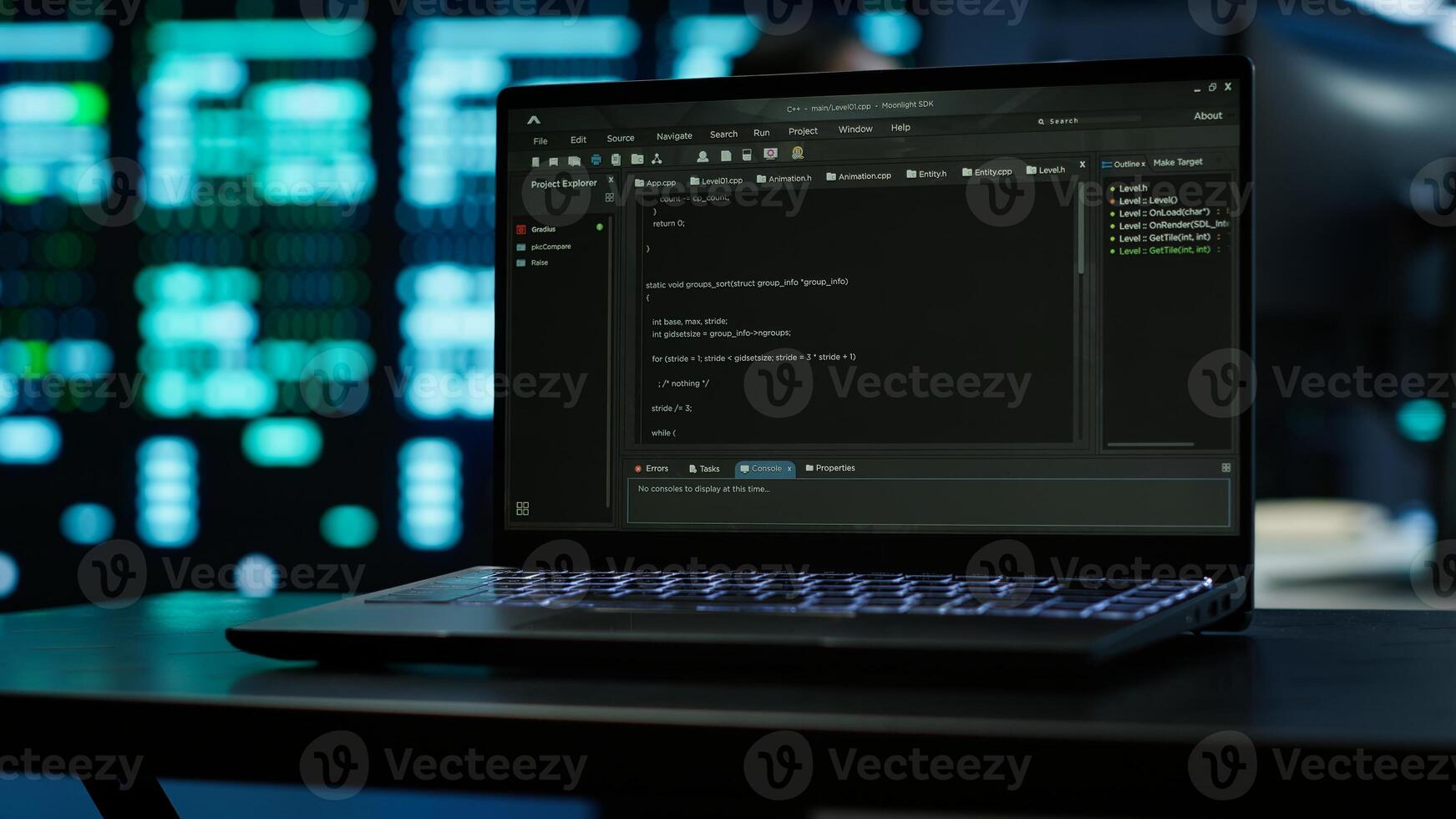 Focus on laptop used by engineers coding in modern data center, monitoring security threats. Close up of notebook used by employee in blurry background ensuring compliance with regulations, camera A photo