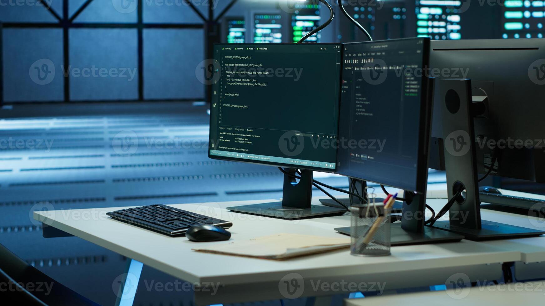 Computers in data center used for monitoring security attacks threatening supercomputers rows. PCs used by futuristic server hub workplace admins to protect equipment, handheld camera shot photo