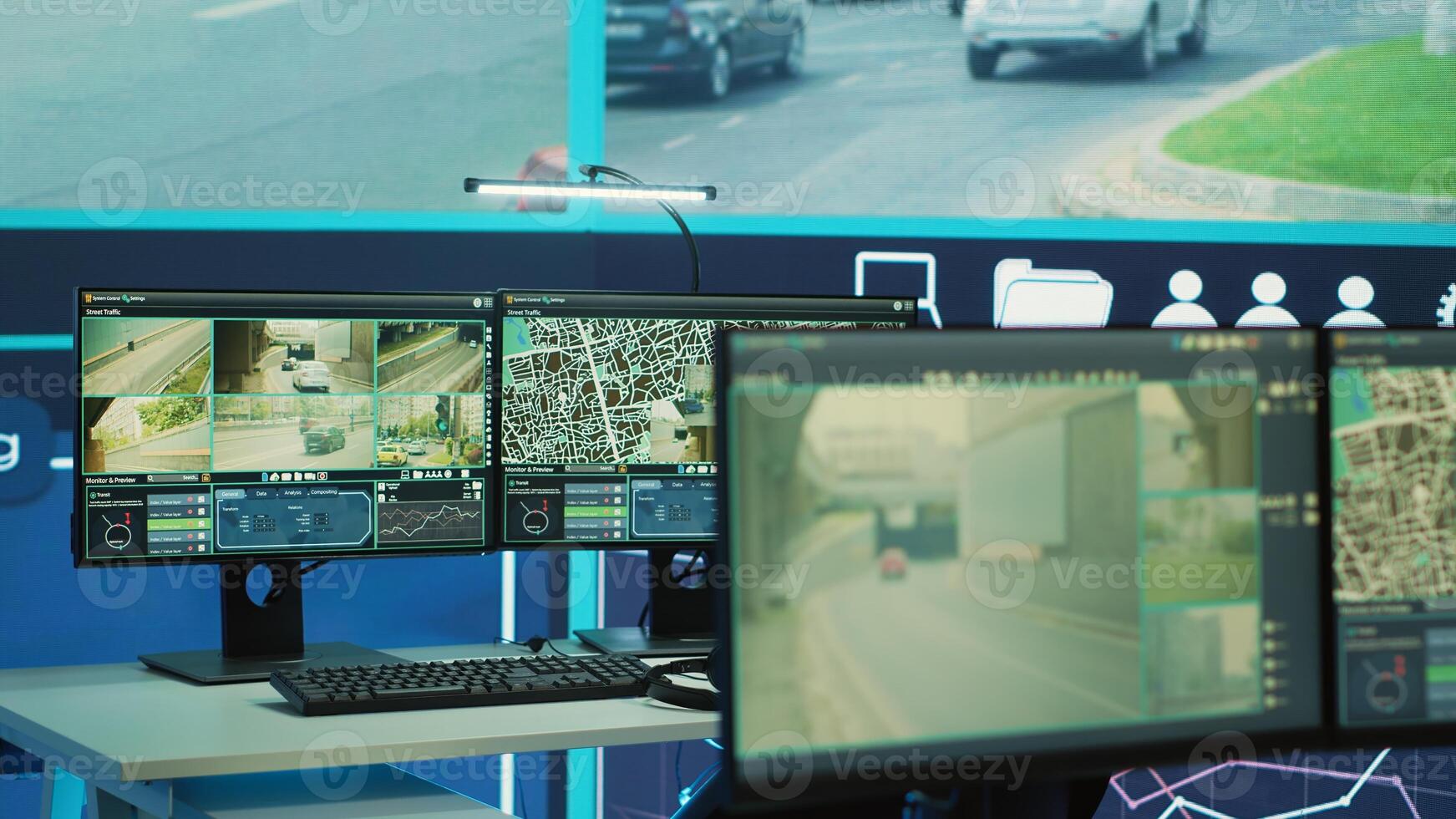 Public security agency office equipped with satellite CCTV cameras system, radar and sensors used in monitoring traffic through surveillance footage. Reconnaissance observation room. photo