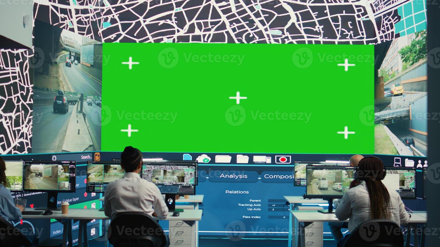 Diverse employees look at mockup screen in monitoring room, following delivery trucks routes around the city and gives directions for the order shipment location. Satellite navigation. Camera B. photo