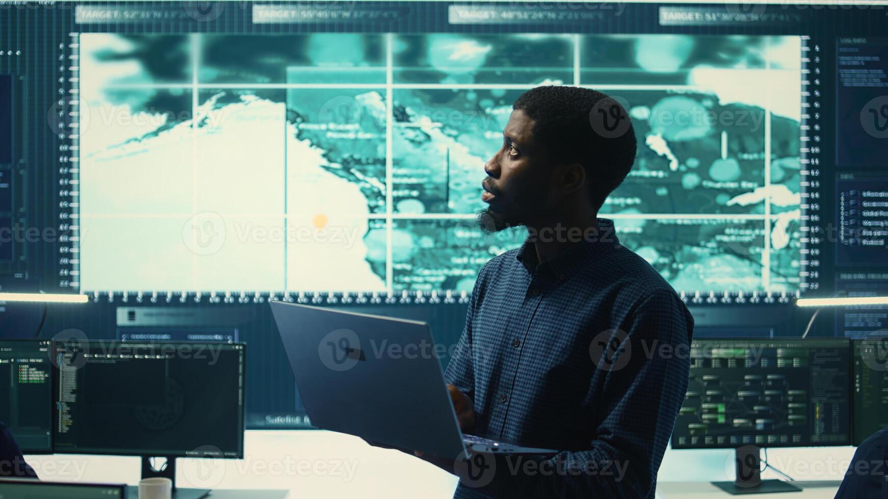 Cyber security team investigates governmental hacking malware attack on internet servers, high tech office. Cybercriminals hack computer systems, threatening account database protection. Camera B. photo