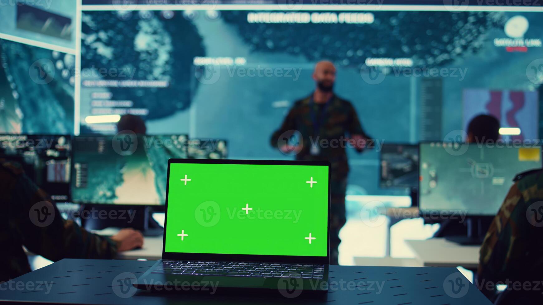Greenscreen running on a laptop in military base command center, team of army officers monitoring coast line activity to ensure national safety. Soldiers detecting suspicious vessels. Camera B. photo