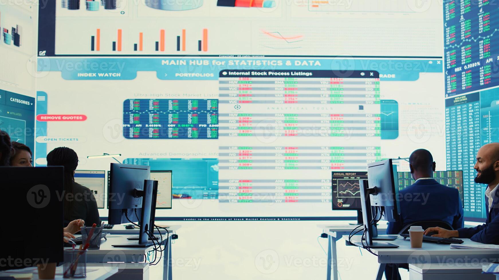 Company employees employing big data used in solving tasks, studying infographics on a huge display. Business analysts reviewing current situation numbers for annual reports. Camera B. photo