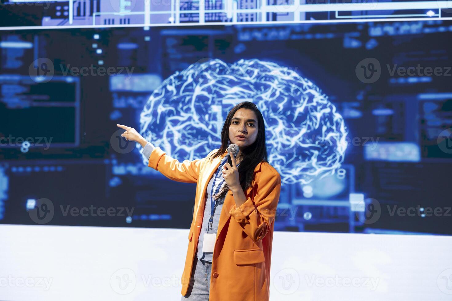 CEO speaking at event bringing together leading experts, researchers, innovators, and companies from around the globe to explore the latest developments in AI and machine learning photo