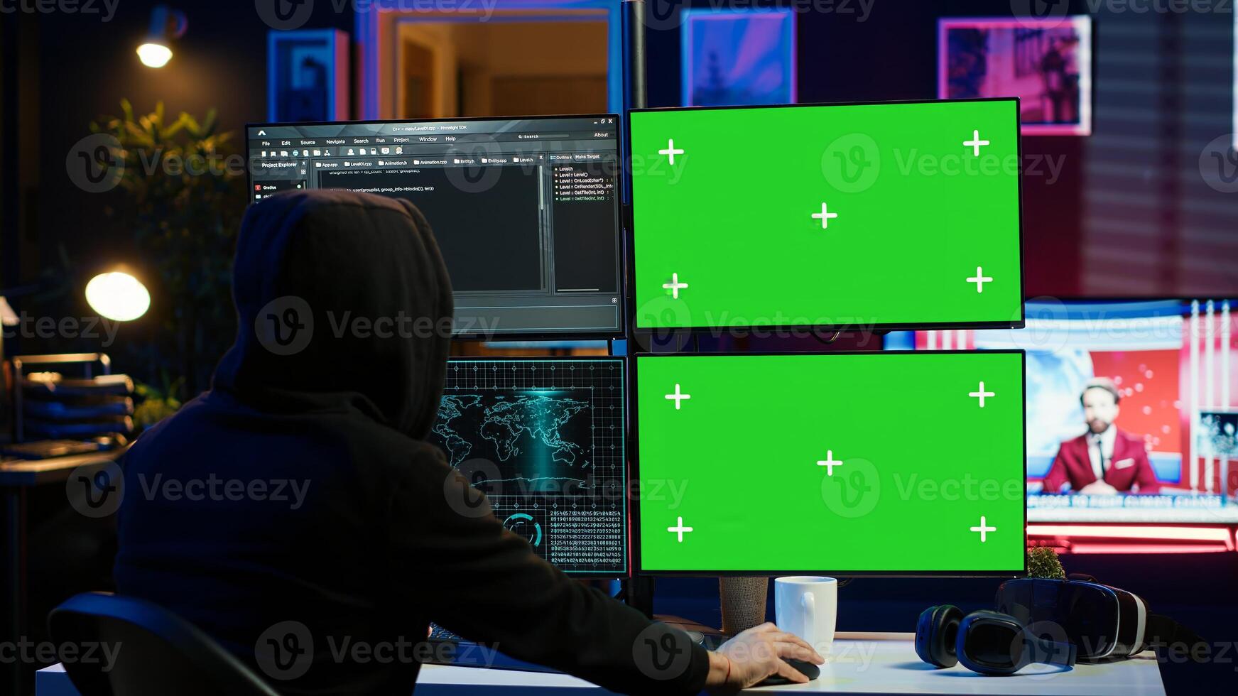 Hooded man writing lines of code on green screen PC from apartment, trying to get past security systems. Evil hacker using mockup computer to make scripts that can hack devices, camera A photo