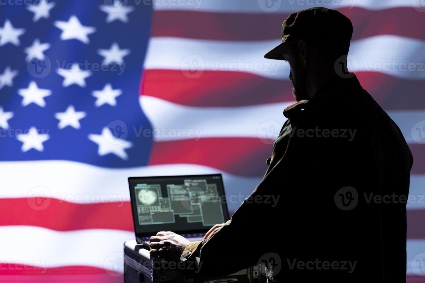 Laptop in CIA command center used by counterterrorism agents to run surveillance efforts against enemy of United States in conformity with Patriot Act law, isolated over USA flag photo
