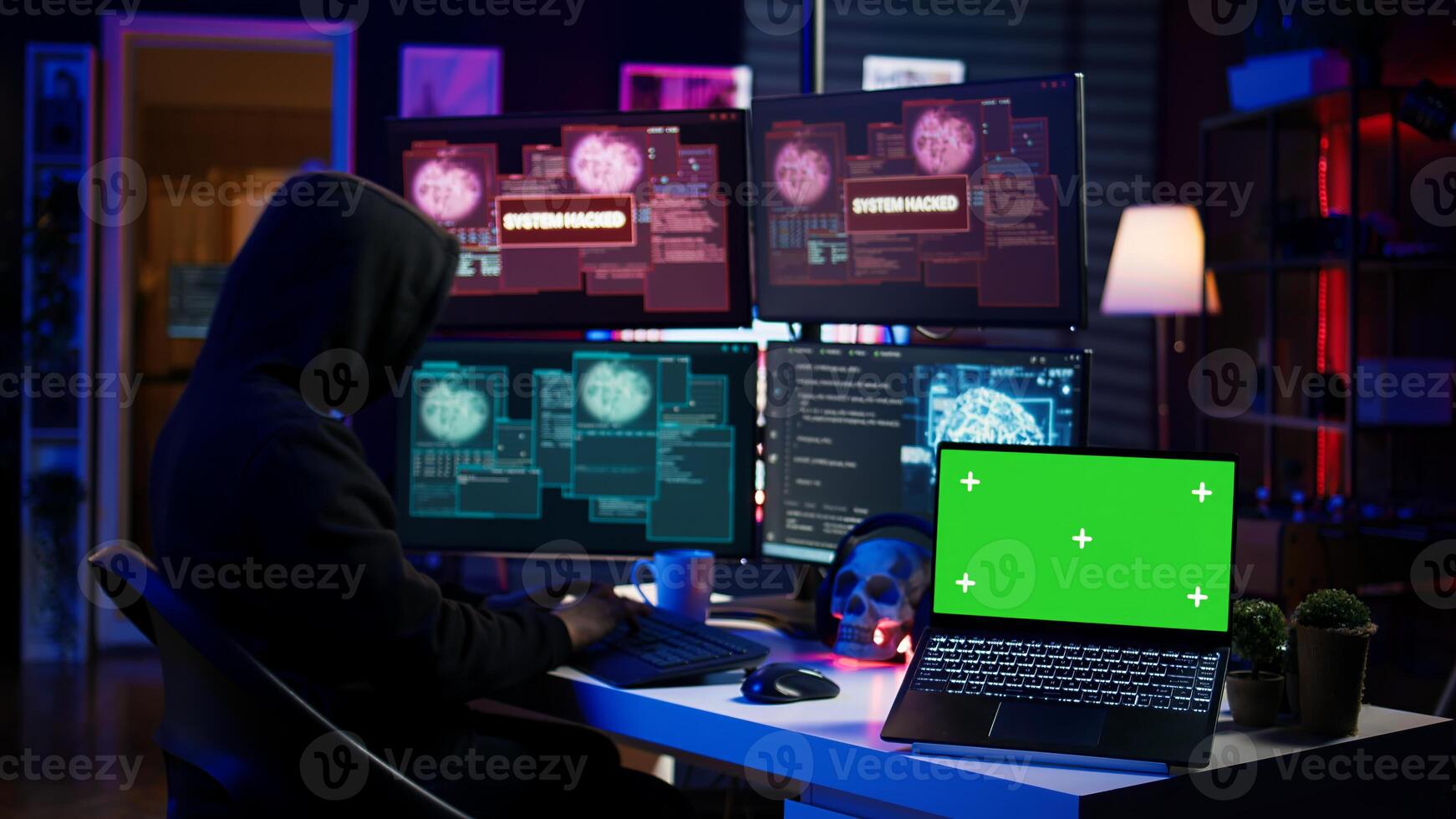 Hacker doing computer sabotage using trojan ransomware on green screen laptop. Cybercriminal uses mockup device to demand ransom money from victims in exchange for access to their data, camera B photo