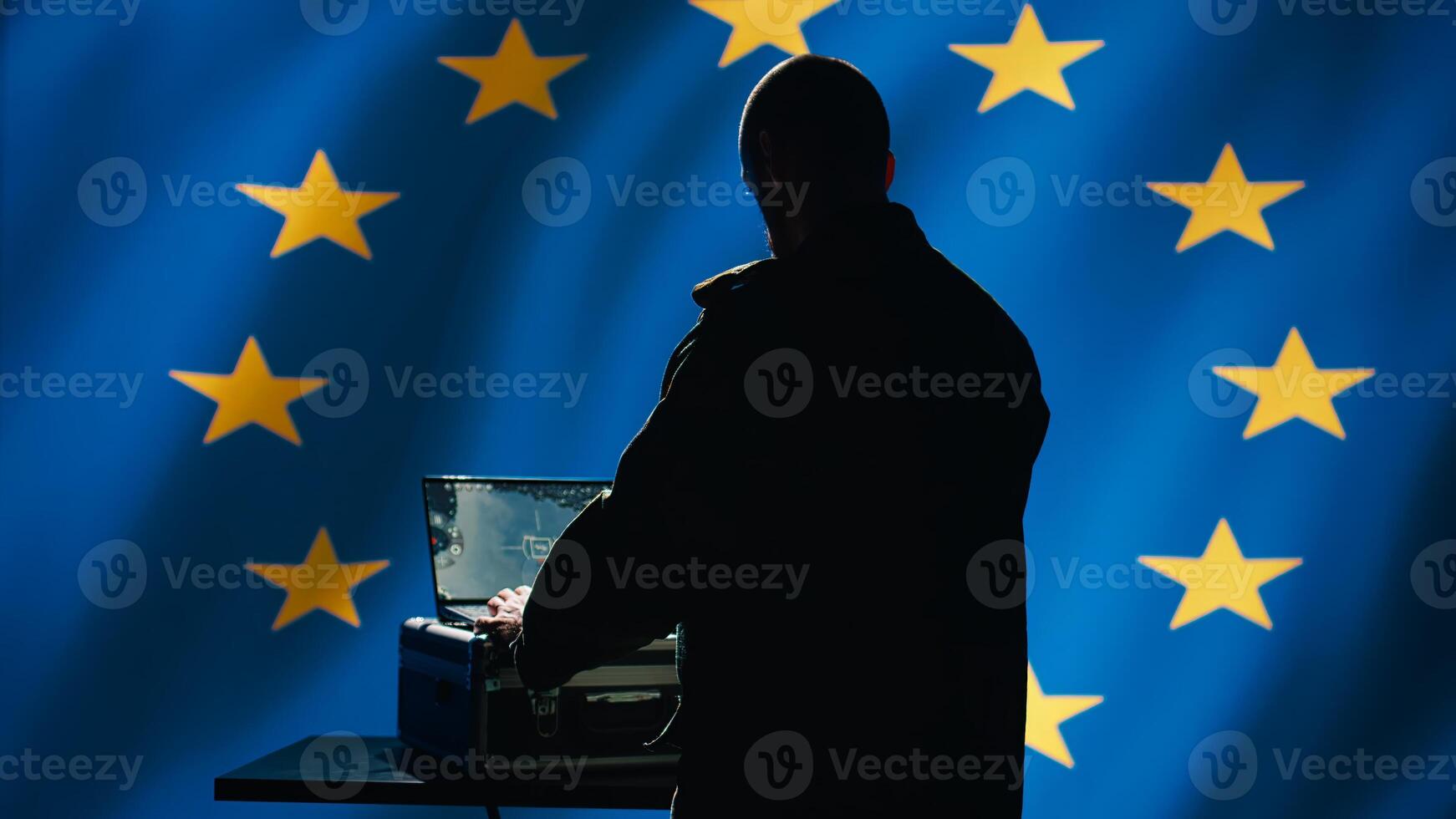 EU air defense operator arrives in control room, uses radar detecting missile attacks, conducting satellite tracking. European Union alliance agent uses military software preventing rockets, camera B photo