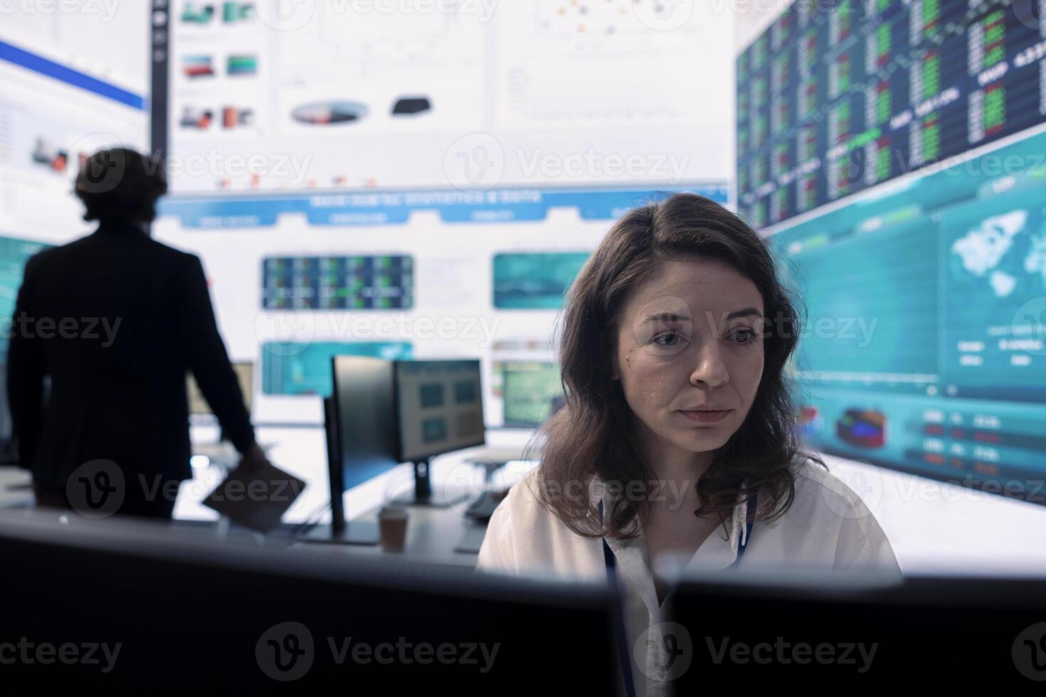 Executive officer analyzing infographics on sales to evaluate supply and demand, find ways of increasing organizational funds and develop the business globally. Strategic objectives. photo