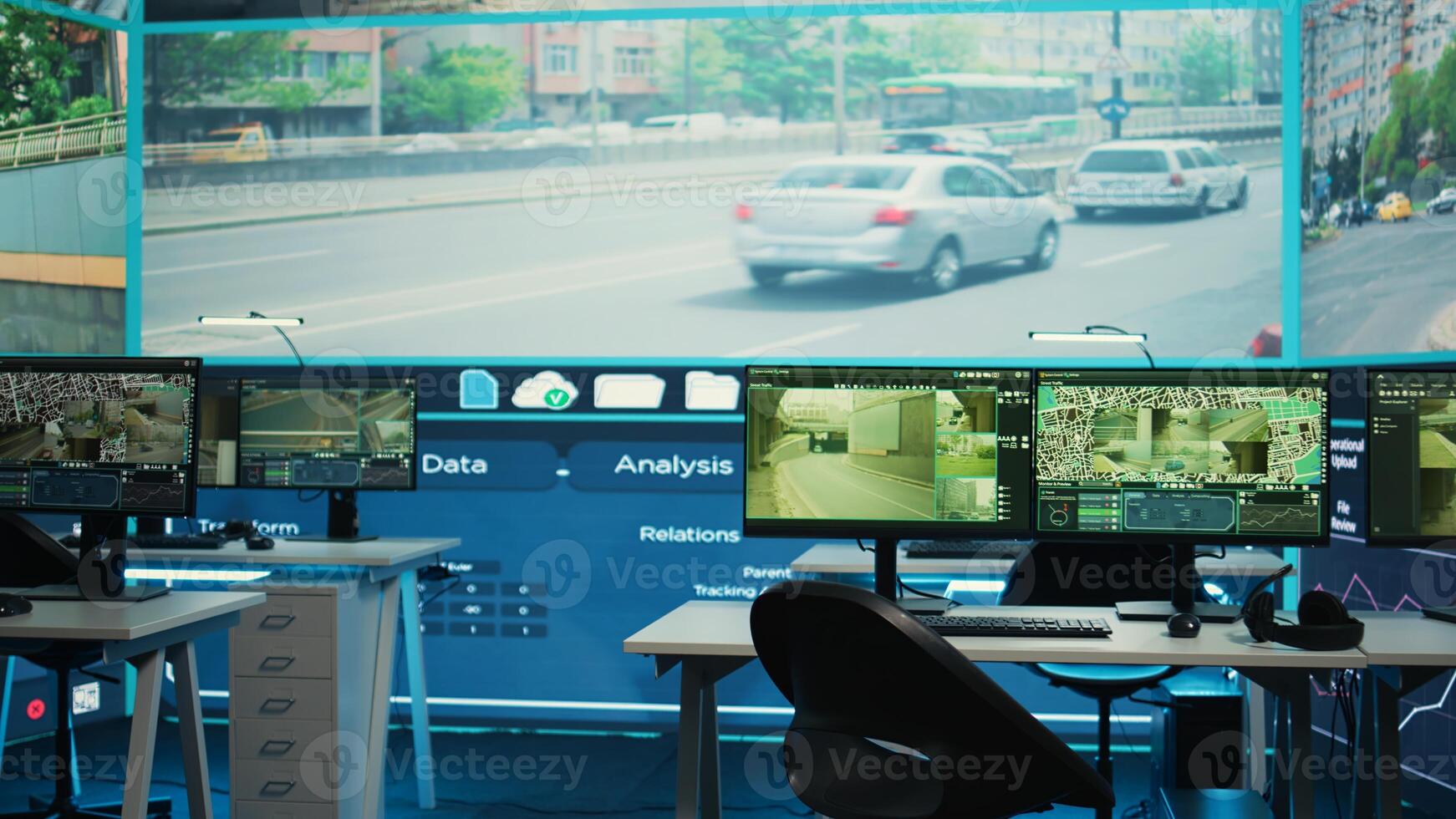 General defense offices with satellite based CCTV network uses real time surveillance images to monitor highway traffic. Administrative transmission and reconnaissance services in observation room. photo